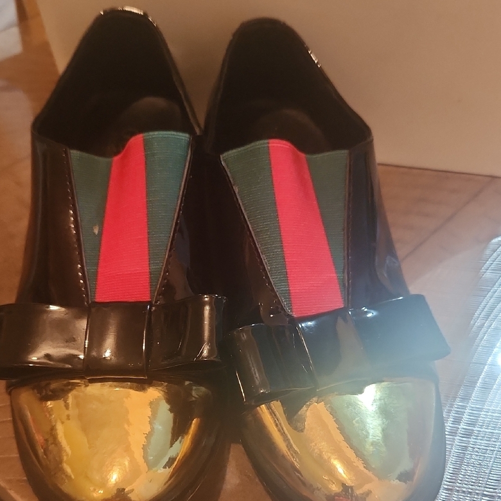 Gucci Black and Gold Loafers with Bow Detail